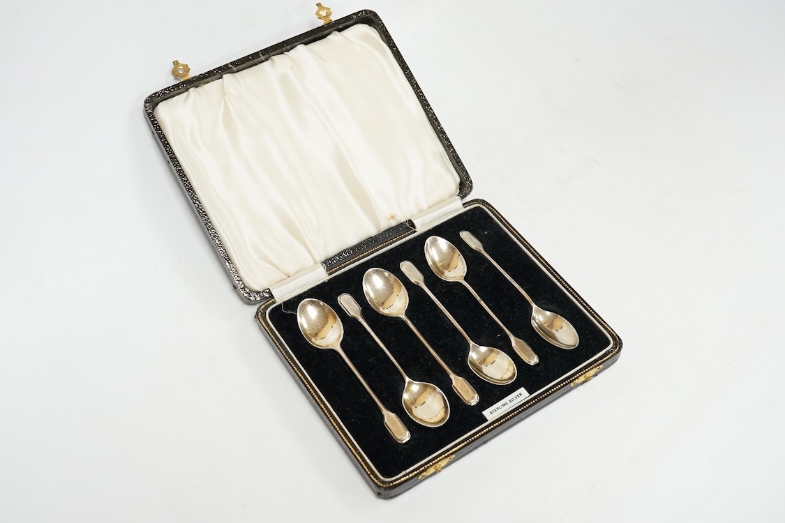 Three assorted silver christening sets including spoon, fork and napkin ring by William Hutton & Sons, London, 1896, one other set with steel knife, two cased sets of silver coffee spoons and a cased set of six Japanese